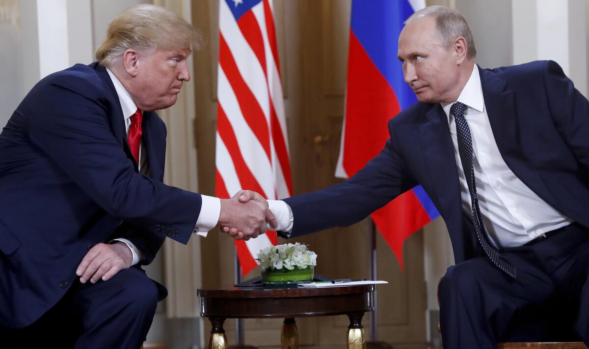 President Trump and Russian President Vladimir Putin, shown meeting Monday in Helsinki, plan another summit in the fall.
