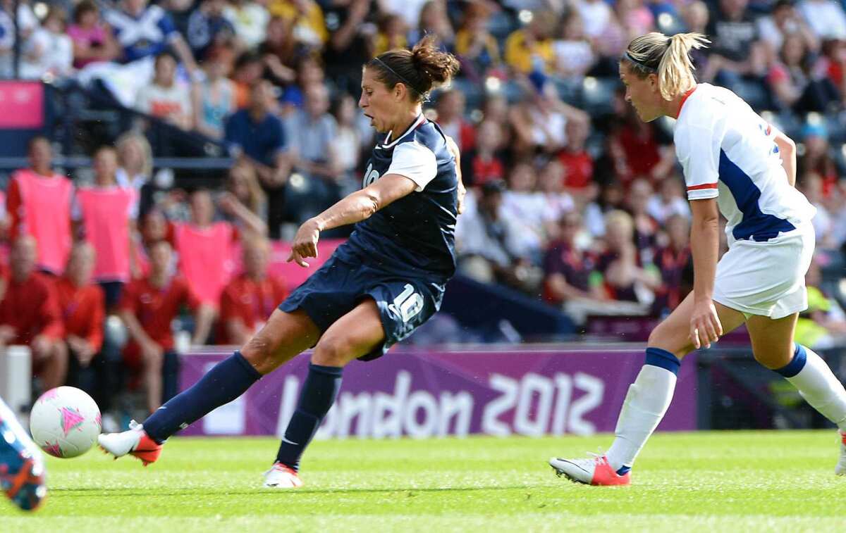 United States midfielder Carli Lloyd scored a goal with this shot against France in a preliminary round match of the 2012 London Olympics.