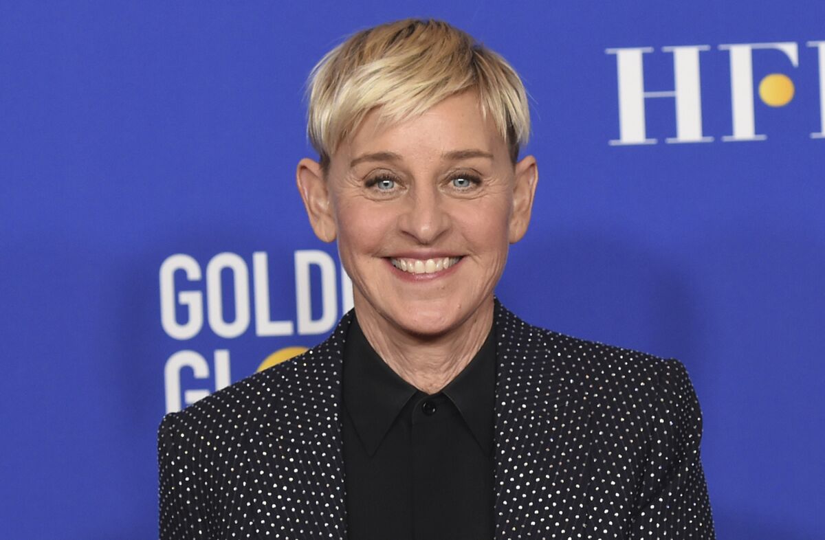 FILE - Ellen DeGeneres poses in the press room at the 77th annual Golden Globe Awards on Jan. 5, 2020, in Beverly Hills, Calif. DeGeneres says she'll be ready to talk when her daytime show returns this month after a staff shake-up prompted by allegations of a toxic workplace. “I can’t wait to get back to work and back to our studio. And, yes, we’re gonna talk about it,” DeGeneres said in a statement announcing the show's Sept. 21, 2020, start of its 18th season. (AP Photo/Chris Pizzello, File)