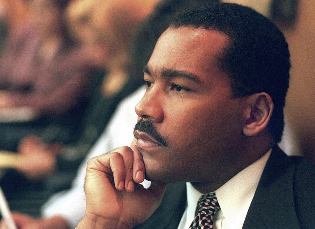 FILE - Dexter King, son of the late civil rights leader Martin Luther King Jr., listens to arguments in the State Court of Criminal Appeals in Jackson, Tenn., Friday, Aug. 29, 1997, to determine whether two Memphis judges have overstepped their authority surrounding the investigation of the King assassination. A memorial service was held Saturday, Feb. 10, 2024, in Atlanta for Dexter Scott King, who died in January at the age of 62 after battling prostate cancer. (Helen Comer/The Jackson Sun via AP, Pool, File)