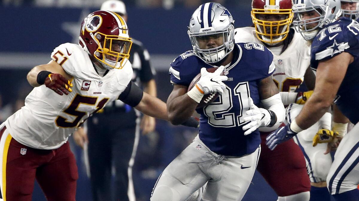 Redskins linebacker Will Compton (51) tries to contain Cowboys running back Ezekiell Elliott as he breaks through the line during a game earlier this season.