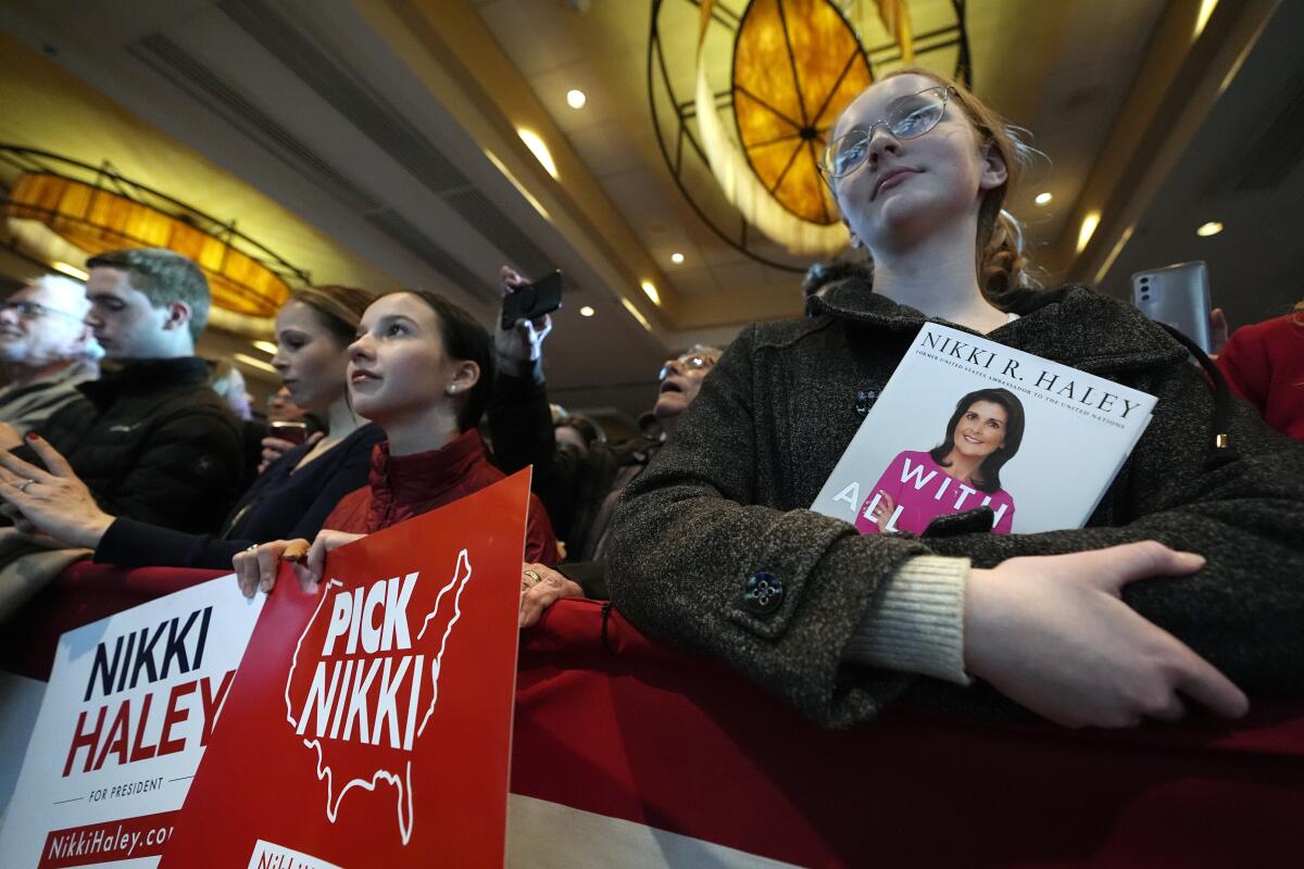 Young supporters listen to Republican presidential candidate former U.N. Ambassador Nikki Haley speak at a campaign event, Sunday, Feb. 25, 2024, in Troy, Mich. (AP Photo/Carlos Osorio)