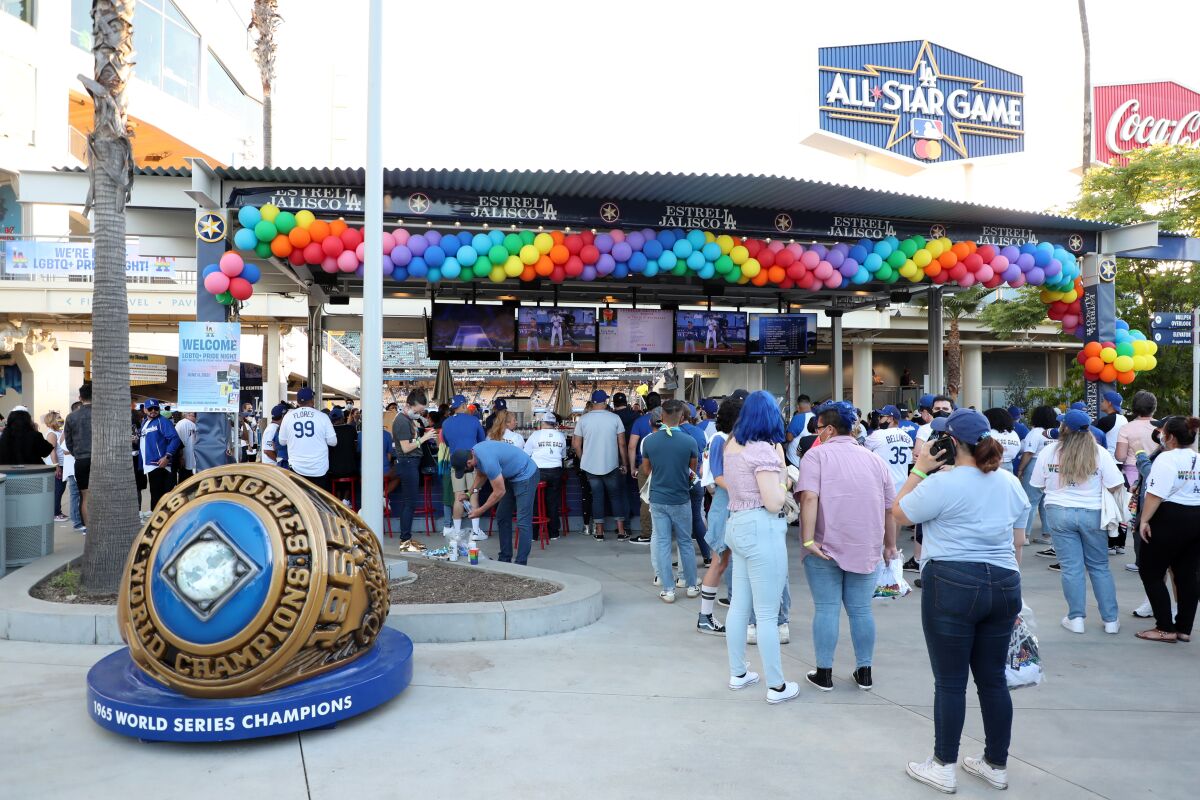 Dodgers fans celebrate LGBTQ+ Pride Night at Dodger Stadium in June 2021.