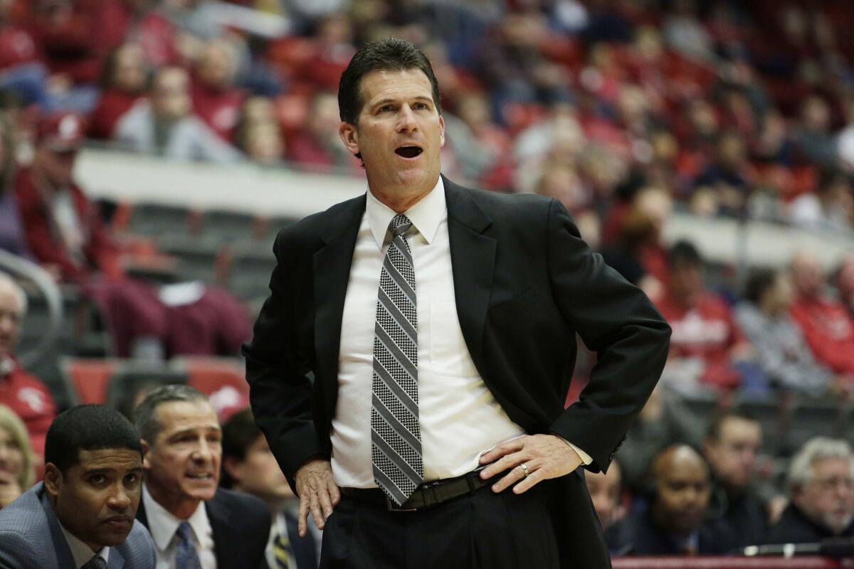 UCLA Coach Steve Alford instructs his team during the first half against Washington State.