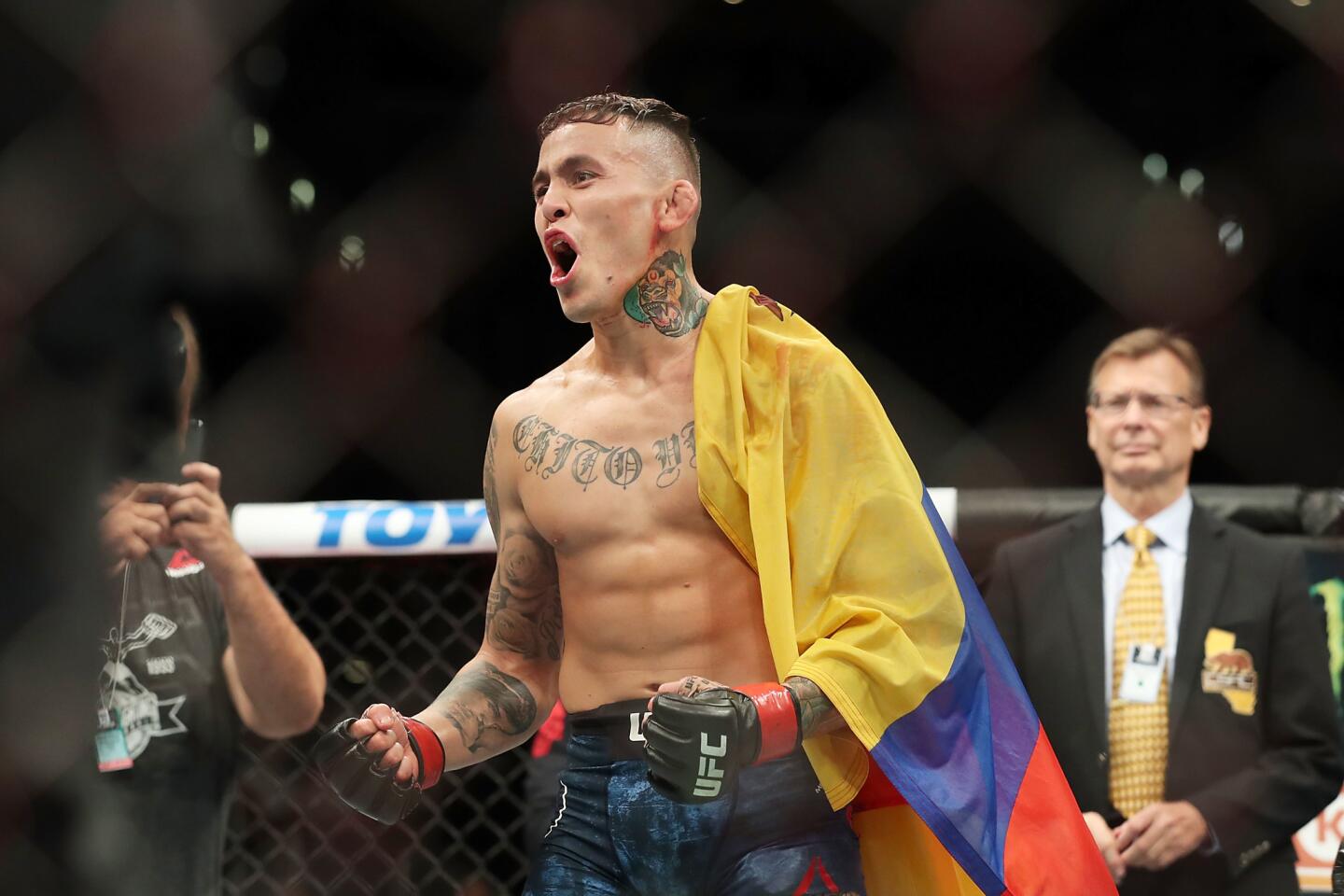 LOS ANGELES, CA - AUGUST 04: Marlon Vera celebrates his win in the second round against Wuliji Buren in the bantamweight bout during UFC 227 at Staples Center on August 4, 2018 in Los Angeles, United States. (Photo by Joe Scarnici/Getty Images) ** OUTS - ELSENT, FPG, CM - OUTS * NM, PH, VA if sourced by CT, LA or MoD **