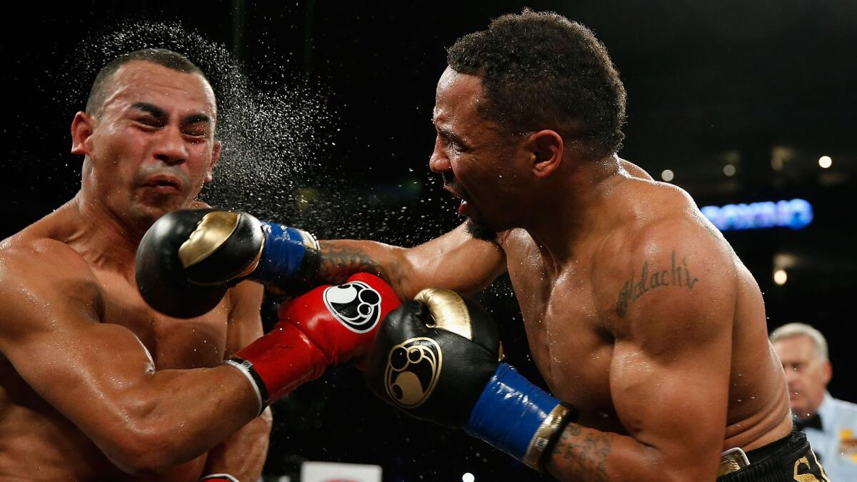 Andre Ward, right, fights Alexander Brand on Aug. 6.