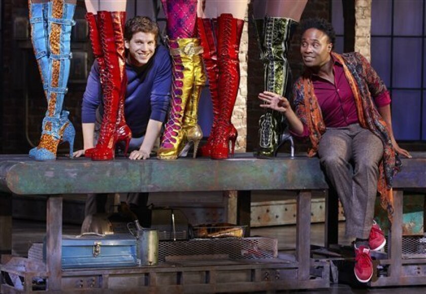 In this Oct. 11, 2012 photo provided by Broadway in Chicago, actors Stark Sands, left, and Billy Porter are seen in a preview performance of "Kinky Boots" at the Bank of America Theatre in Chicago. Illinois has a tax credit to attract pre-Broadway and long-run shows to the state. "Kinky Boots" has applied for the tax credit. (AP Photo/Courtesy of Broadway in Chicago, Sean Williams)