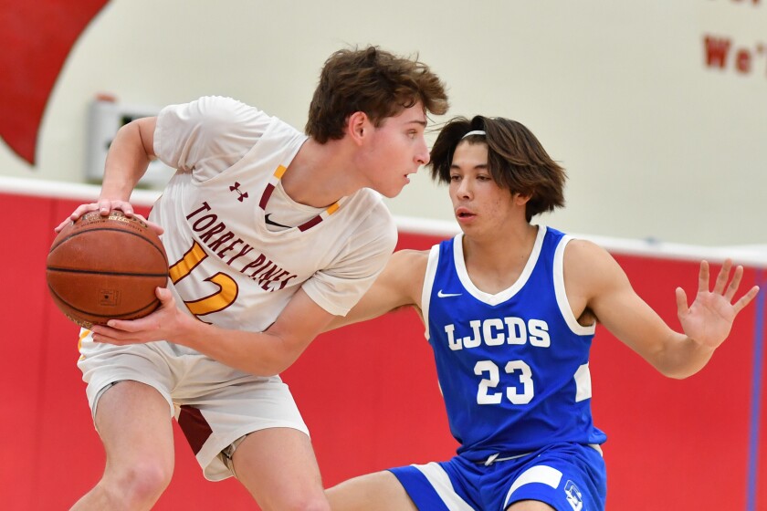 Senior Cameron Klein with the ball in a match-up against LJCD.