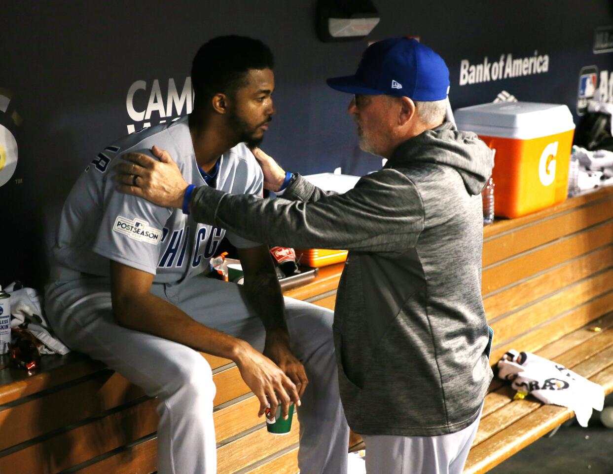 Cubs manager Joe Maddon (70) talks to reliever Carl Edwards Jr. (6) after he pitched the sixth inning Game 2 of the National League Championship Series against the Dodgers at Dodger Stadium in Los Angeles on Sunday, Oct. 15, 2017.