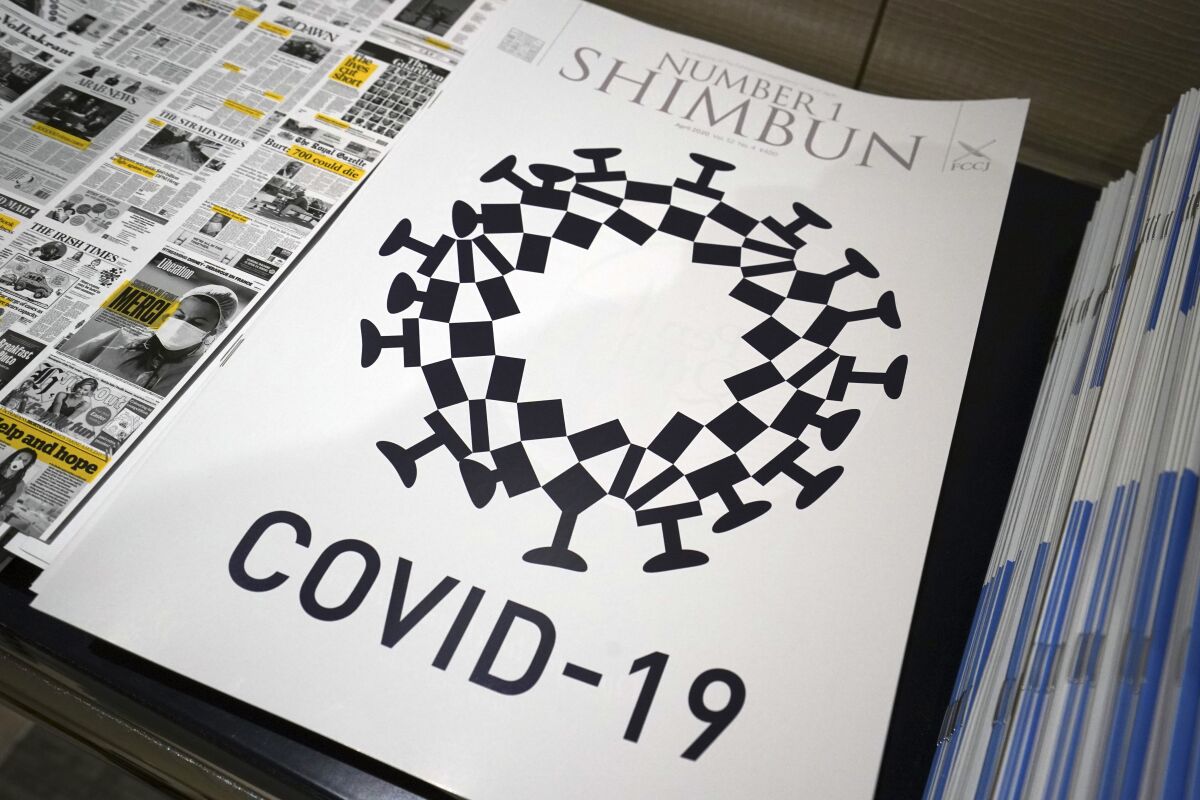 A cover design for the magazine Number 1 Shimbun combined the Tokyo 2020 logo with features of the COVID-19 virus.