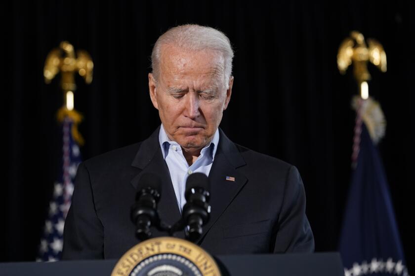 President Joe Biden pauses as he speaks in Miami Beach, Fla., Thursday, July 1, 2021, about the condo tower that collapsed in Surfside, Fla., last week. (AP Photo/Susan Walsh)