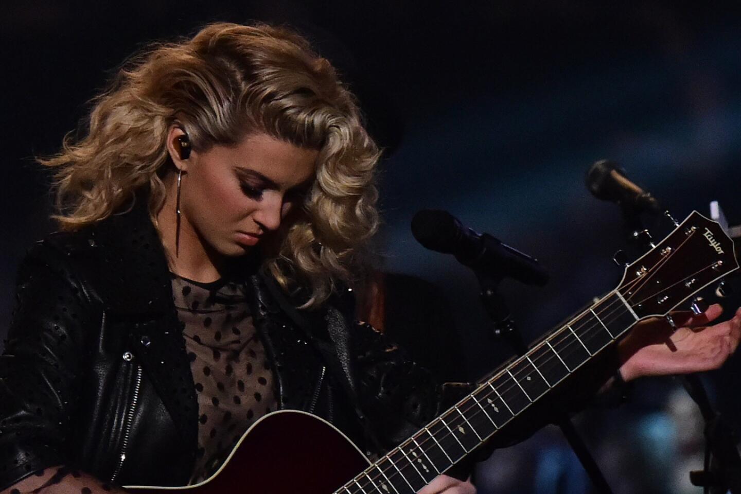 Singer Tori Kelly sings a rendition of her song "Hollow" with James Bay.
