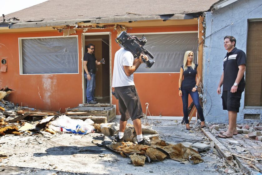Husband and wife team Christina and Tarek El Moussa film "Flip or Flop" while renovating a 1930s home in Anaheim.
