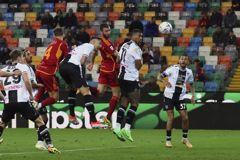 Roma's Bryan Cristante scores their side's second goal of the game during the Serie A soccer match recovery between Udinese and Roma at the Bluenergy Stadium in Udine, Italy, Thursday, April 25, 2024. (Andrea Bressanutti/Lapresse via AP)