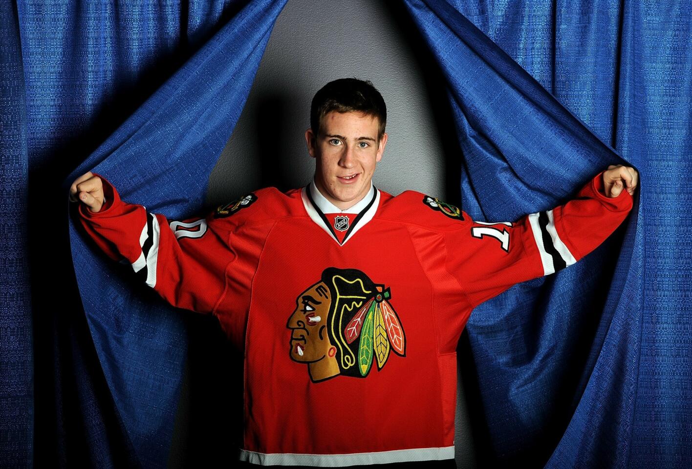 Never signed a contract with the Hawks before signing with the Rangers.