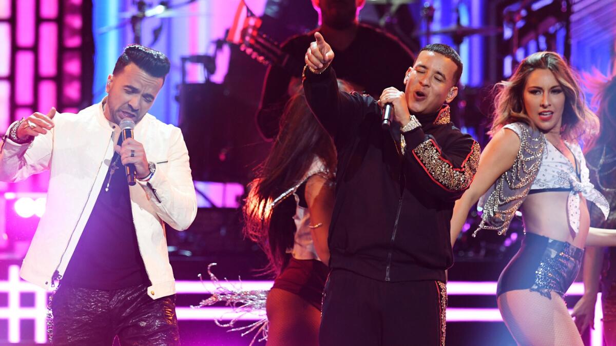 Luis Fonsi, left, and Daddy Yankee perform at last year's Grammy awards show at Madison Square Garden.