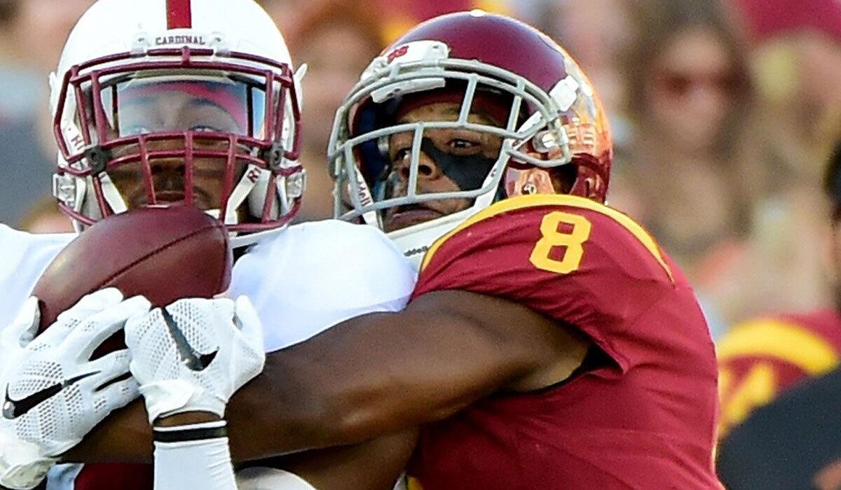 USC's Iman Marshall, right, defends Stanford's Francis Owusu on Sept. 19.