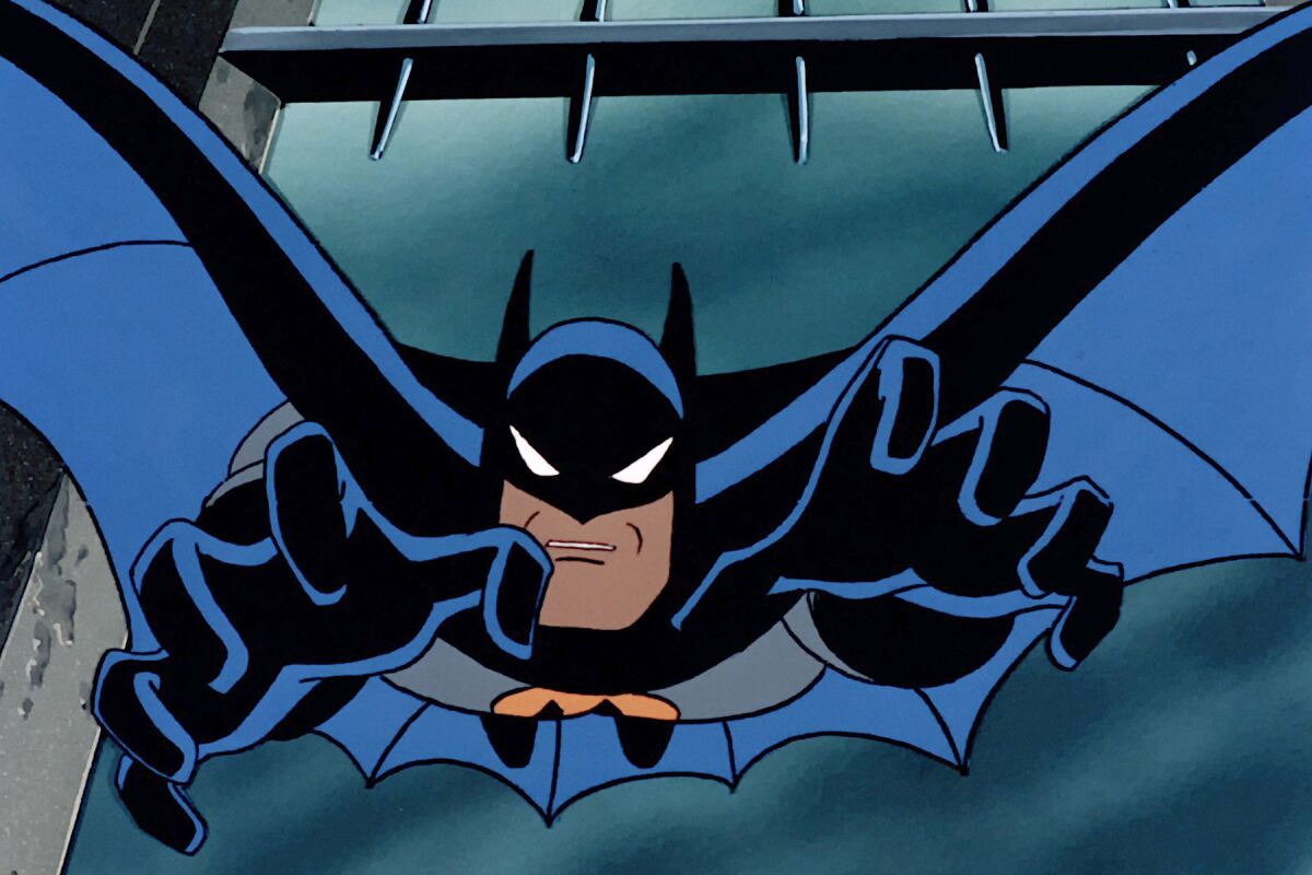 Batman leaps with arms outstretched