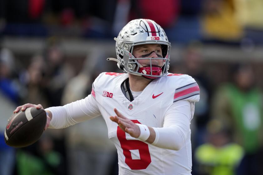 FILE - Ohio State quarterback Kyle McCord throws during the first half of an NCAA college football game against Michigan, Saturday, Nov. 25, 2023, in Ann Arbor, Mich. McCord went 11-1 as a starter with the Buckeyes and has looked polished throughout the spring.(AP Photo/Carlos Osorio, File)