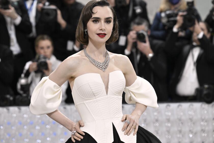 Lily Collins attends The Metropolitan Museum of Art's Costume Institute benefit gala celebrating the opening of the "Karl Lagerfeld: A Line of Beauty" exhibition on Monday, May 1, 2023, in New York. (Photo by Evan Agostini/Invision/AP)