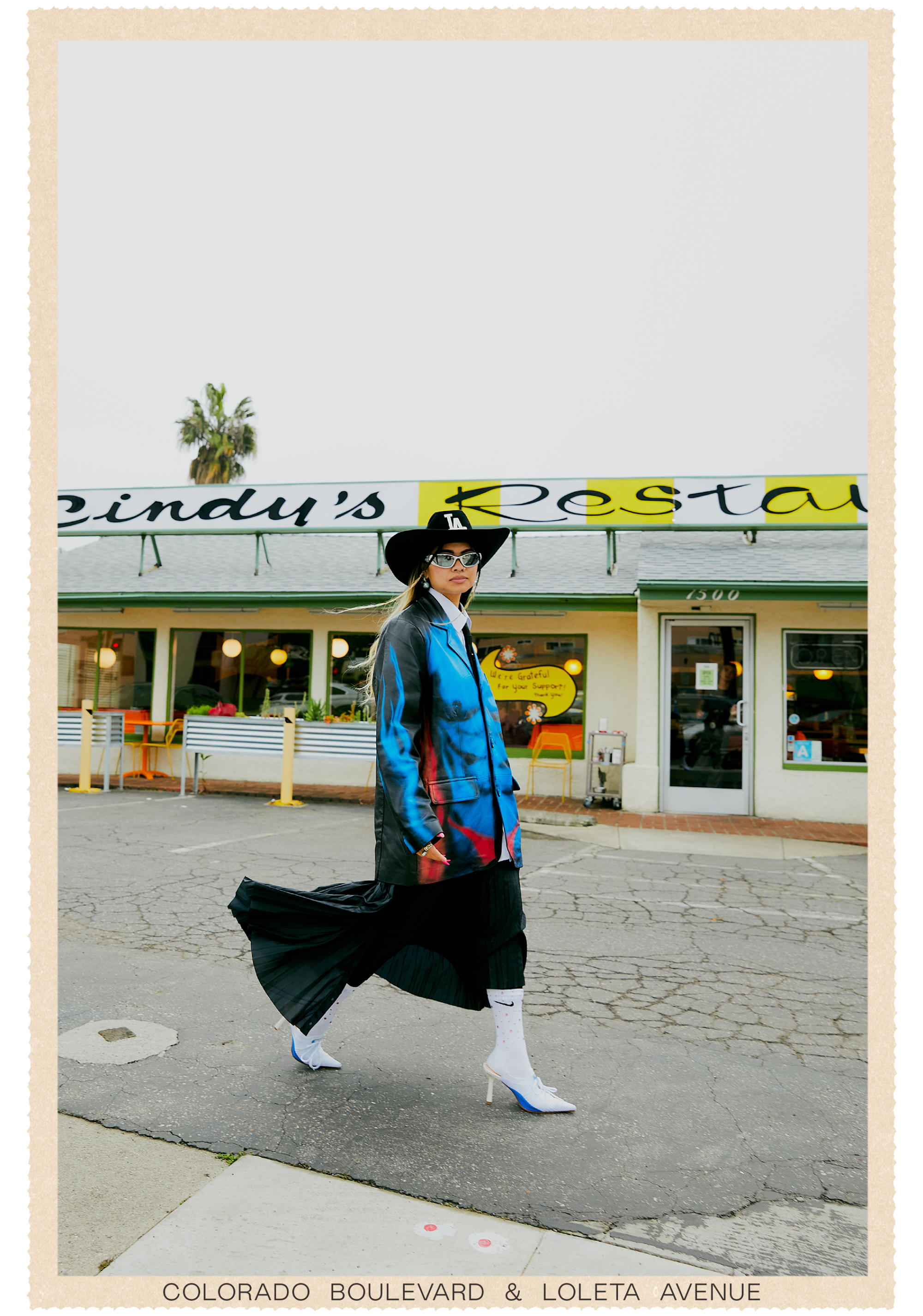 Ann-Marie Hoang walks in front of Cindy's diner.