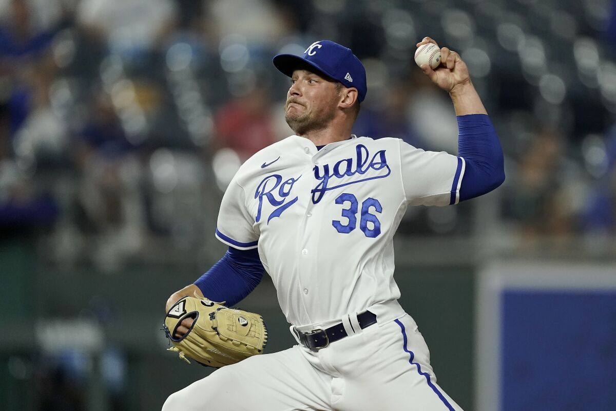Kansas City Royals relief pitcher Anthony Misiewicz throws during the sixth inning of a baseball game against the Minnesota Twins on Sept. 21, 2022, in Kansas City, Mo. The St. Louis Cardinals acquired Misiewicz from their cross-state rival Kansas City Royals for cash considerations on Wednesday. Feb. 8, 2023. (AP Photo/Charlie Riedel, File)