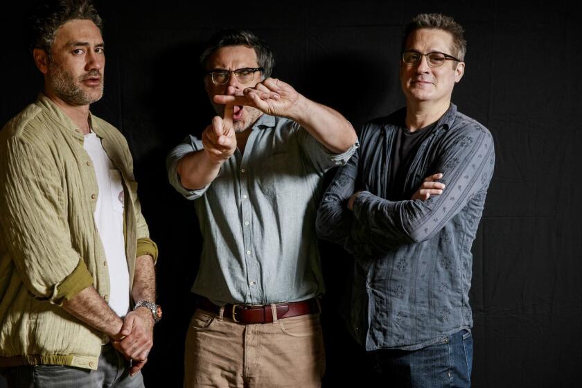 PASADENA, CALIF. -- MONDAY, FEBRUARY 4, 2019: From left, Taika Waititi, Jemaine Clement and Paul Simms pose for a portrait to promote FX's vampire comedy series "What We Do in the Shadows," in Pasadena, Calif., on Feb. 4, 2019. (Marcus Yam / Los Angeles Times)