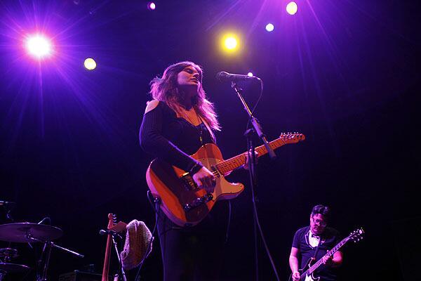 Best Coast's Bethany Cosentino plays onstage at Los Angeles' Club Nokia on New Year's Eve 2011.