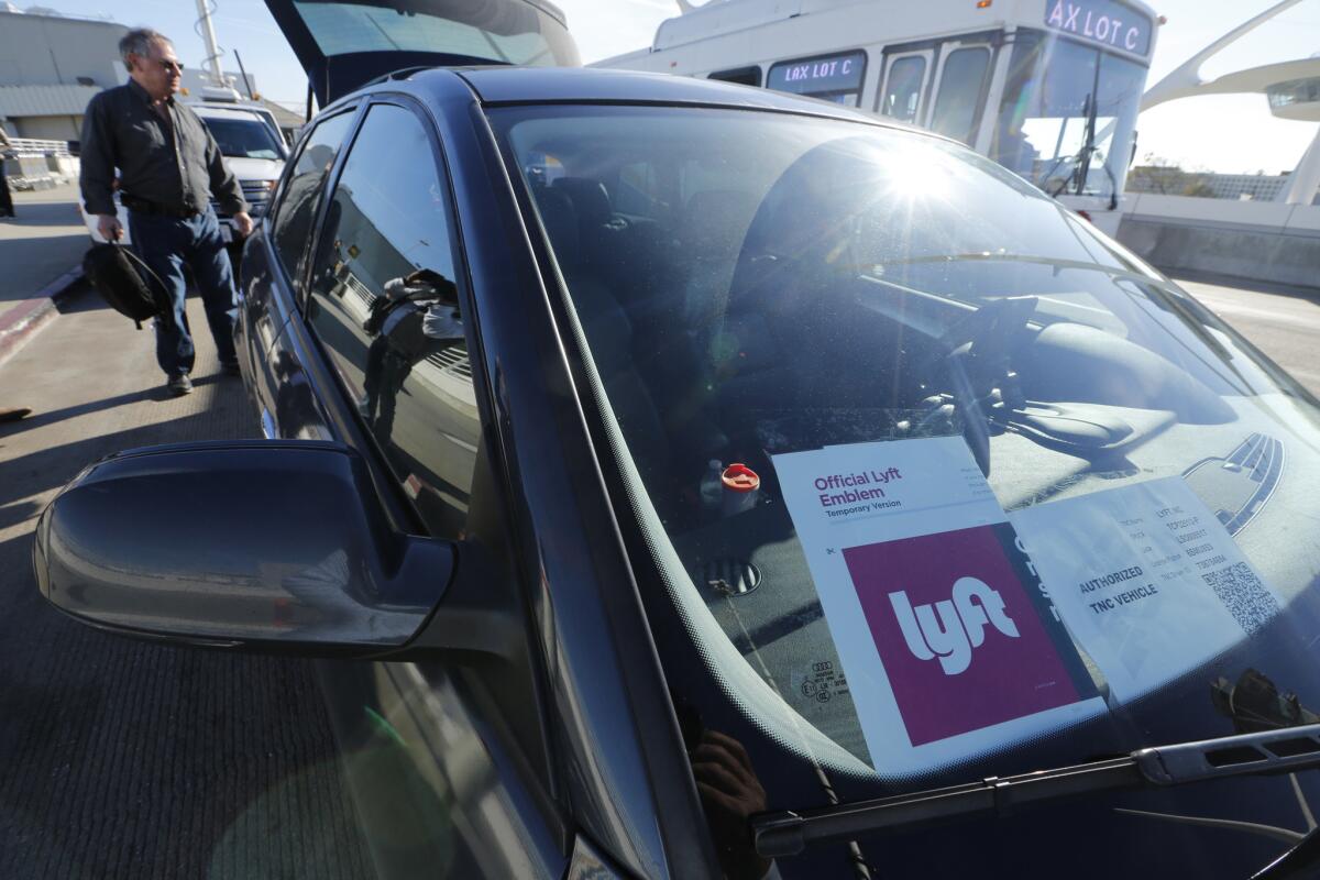A Lyft vehicle is spotted at Los Angeles International Airport.