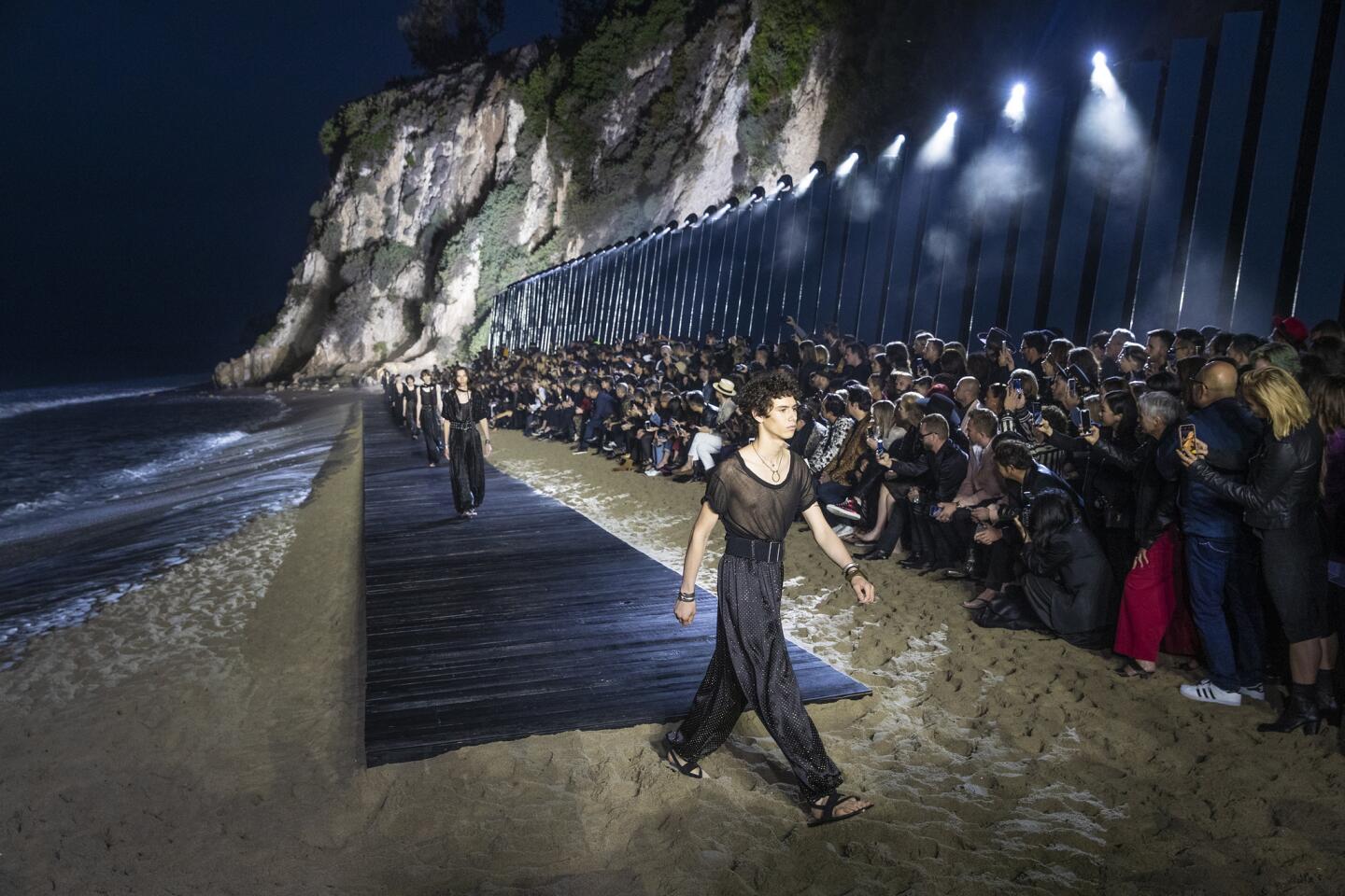 The Saint Laurent spring/summer 2020 menswear runway show on the beach in Malibu.