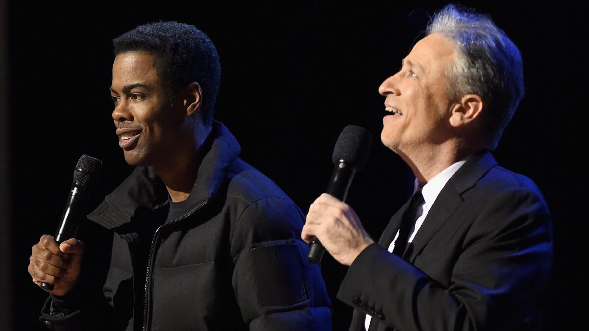 Chris Rock, left, and Jon Stewart in Comedy Central's "Night of Too Many Stars: America Comes Together for Autism Programs."