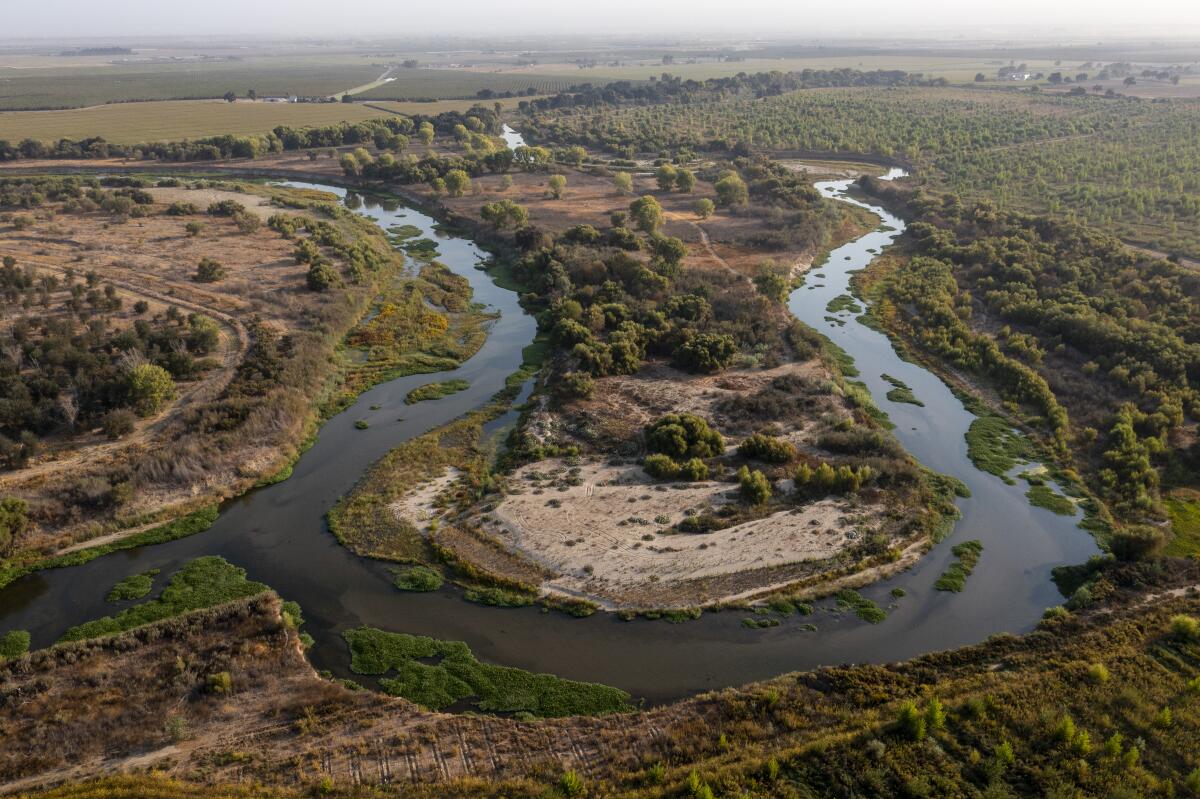 Aerial view of the San Joaquin River, left, and Tuolumne River, right, meeting at the former Dos Rios Ranch outside Modesto. 