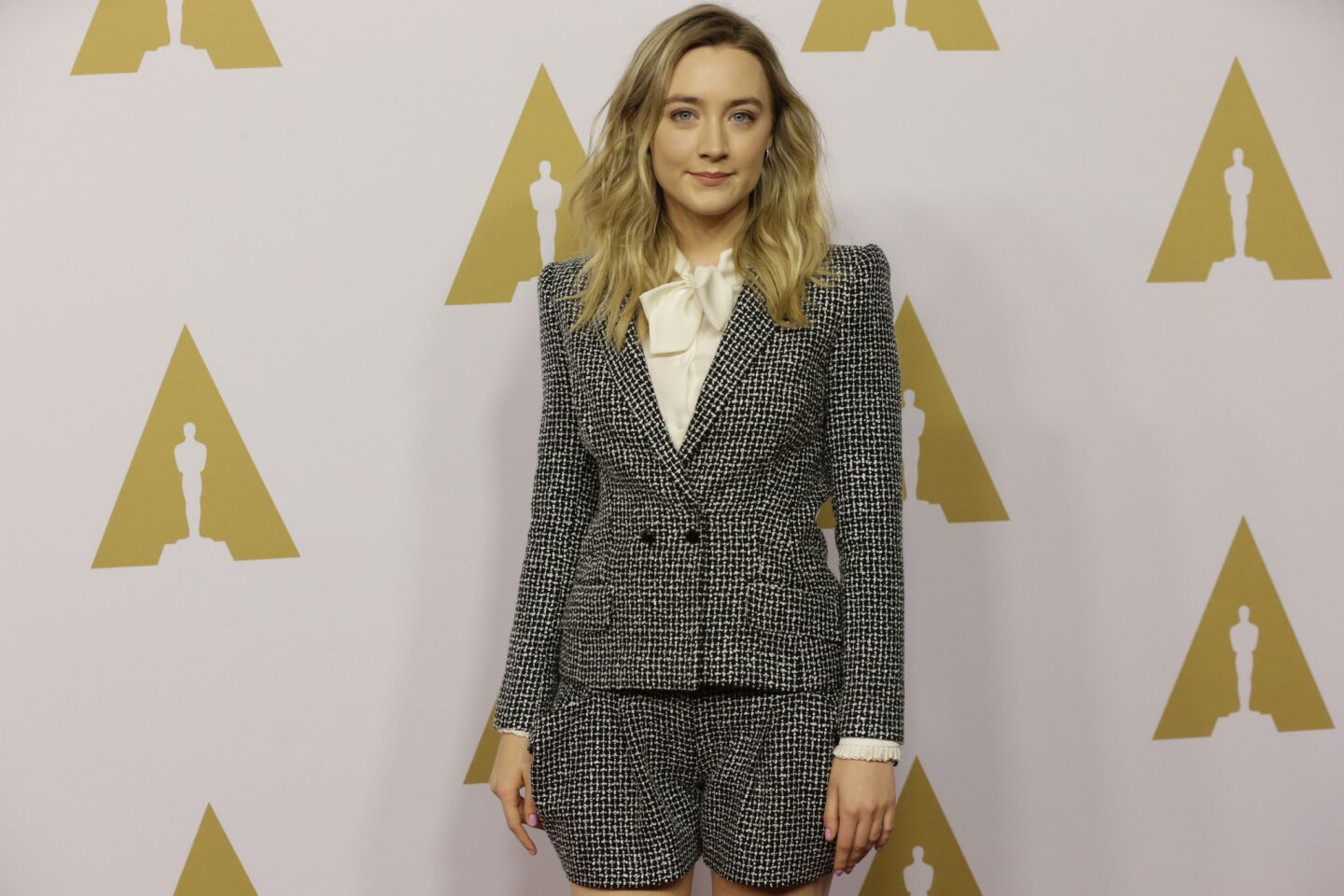 Saoirse Ronan arrives for the 88th annual Academy Awards luncheon at the Beverly Hilton Hotel.