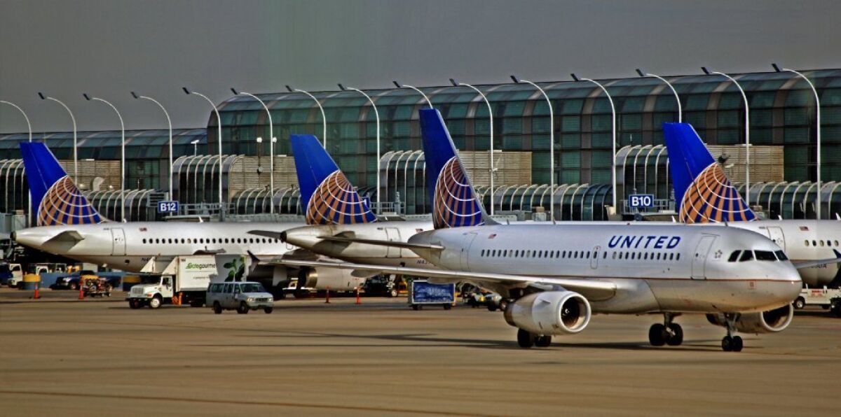 United Airlines planes parked on the tarmac. The airline has added a new system to try to eliminate missed connections by passengers.