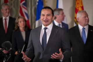 Premier of Manitoba Wab Kinew, accompanied by other Council of the F