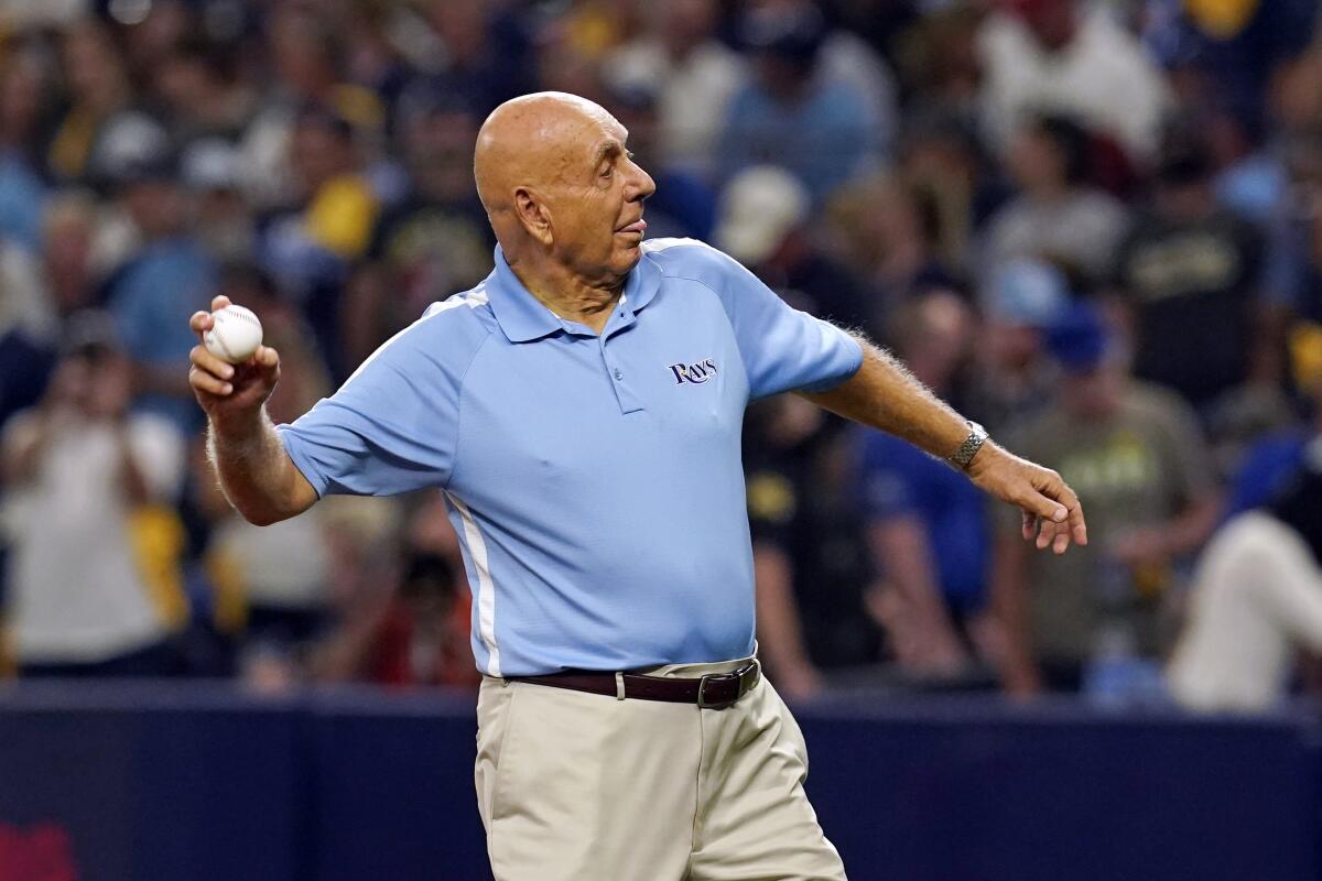 ESPN broadcaster Dick Vitale throws out the first pitch before Game 1 of the American League Division Series.