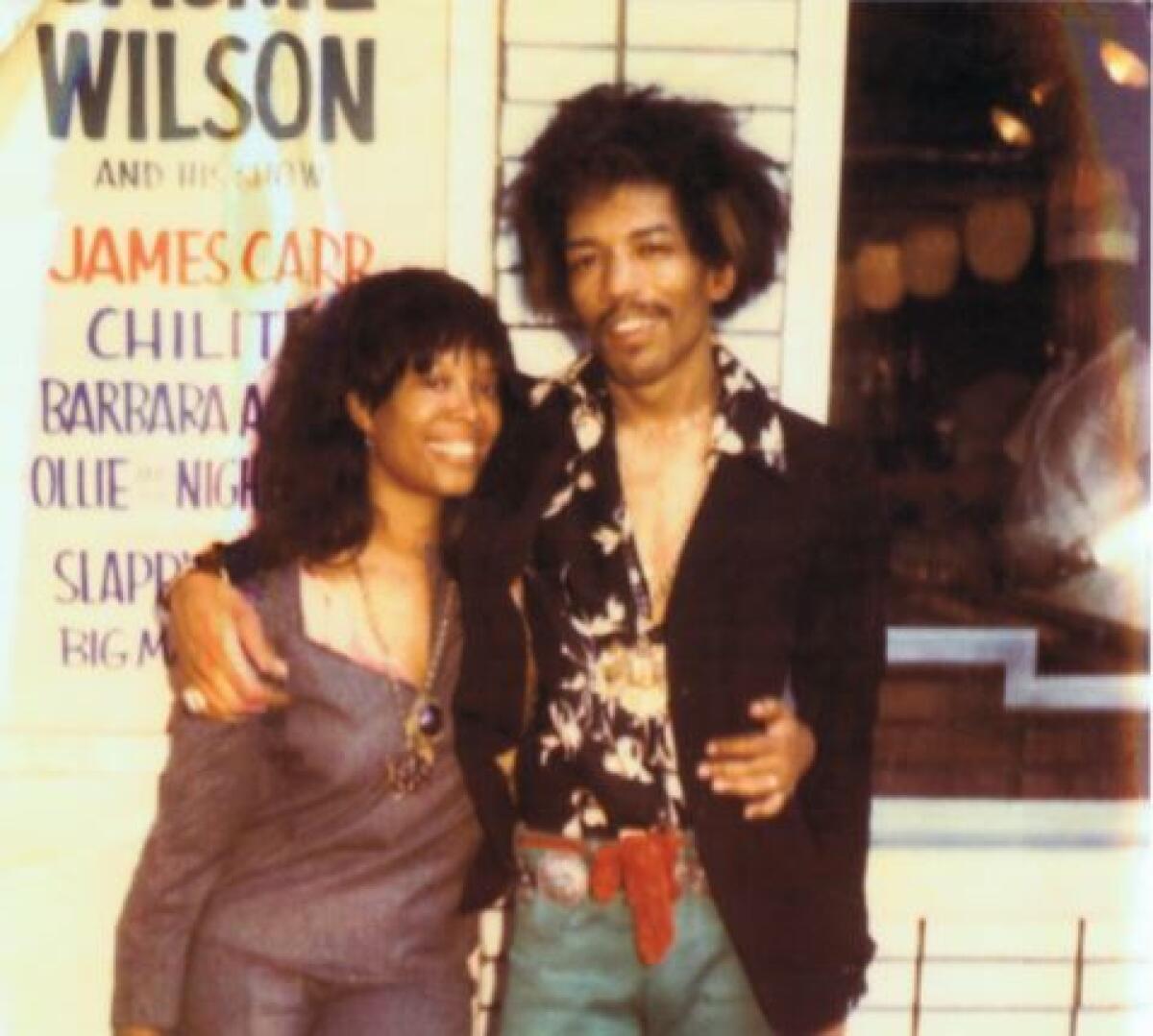 Lithofayne Pridgon and Jimi Hendrix outside the Apollo Theater in 1969.