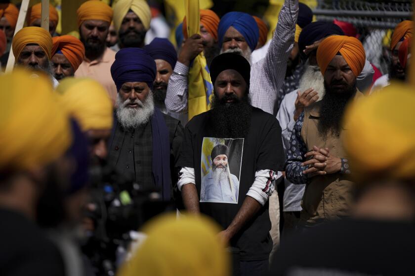 A mourner of Sikh community leader and temple president Hardeep Singh Nijjar in  British Columbia.