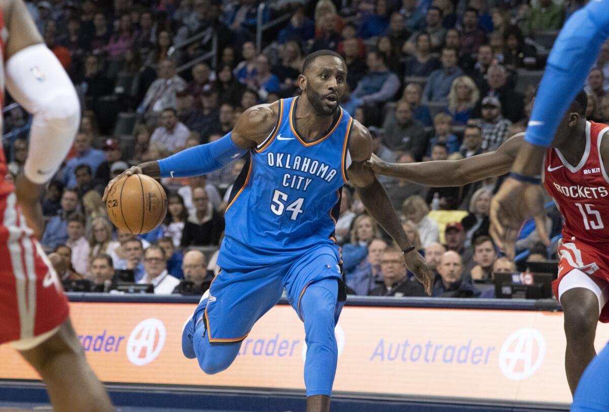 Patrick Patterson, then with the Oklahoma City Thunder, drives against the Houston Rockets during a game last season.