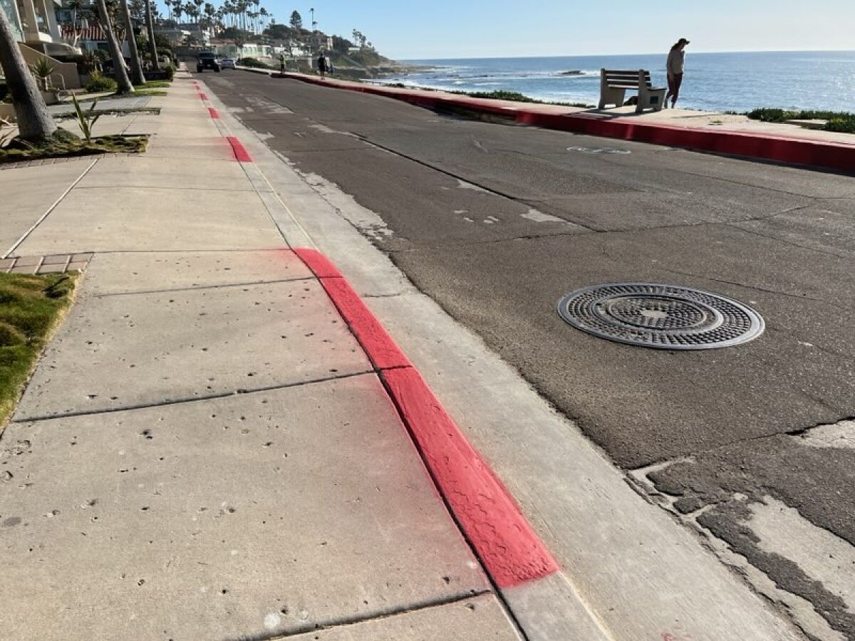 The painting of these red curbs was done by the city of San Diego, though some people thought it was done by a resident.