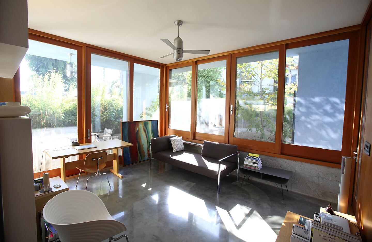 The doors and windows from Taylor Brothers Architectural Products in Los Angeles cost about $25,000, a splurge justified by the welcome sense of openness they provide. "We kept cost in mind to know when to spend and when not to," designer Molina says.