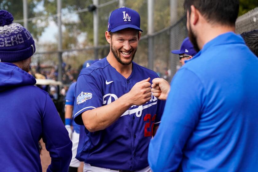 PHOENIX, ARIZ. - FEBRUARY 23: Los Angeles Dodgers pitcher Clayton Kershaw (22), after pitching during live batting practice during a Spring Training, before a game against the Chicago Cubs at Camelback Ranch on Sunday, Feb. 23, 2020 in Phoenix, Ariz. (Kent Nishimura / Los Angeles Times)