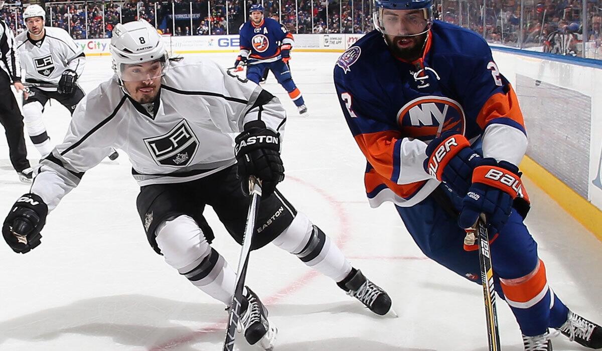 Drew Doughty tries to stop the New York Islanders' Nick Leddy on March 26.