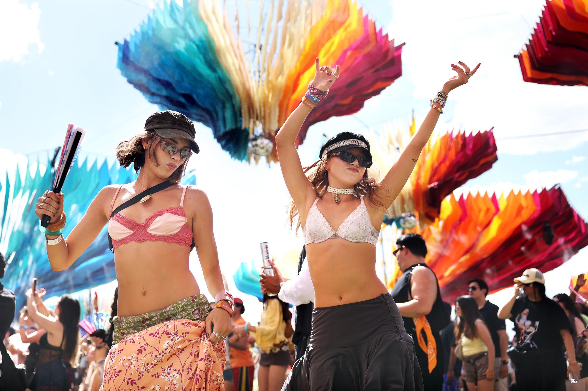 Two girls in bikinis dancing at DoLab at Coachella