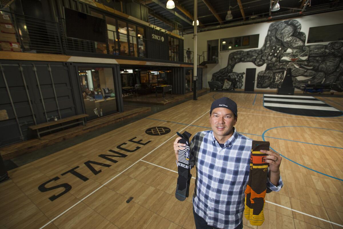 Clarke Miyasaki, head of business development at Stance Socks, has helped turn the San Clemente company into a well-known brand.