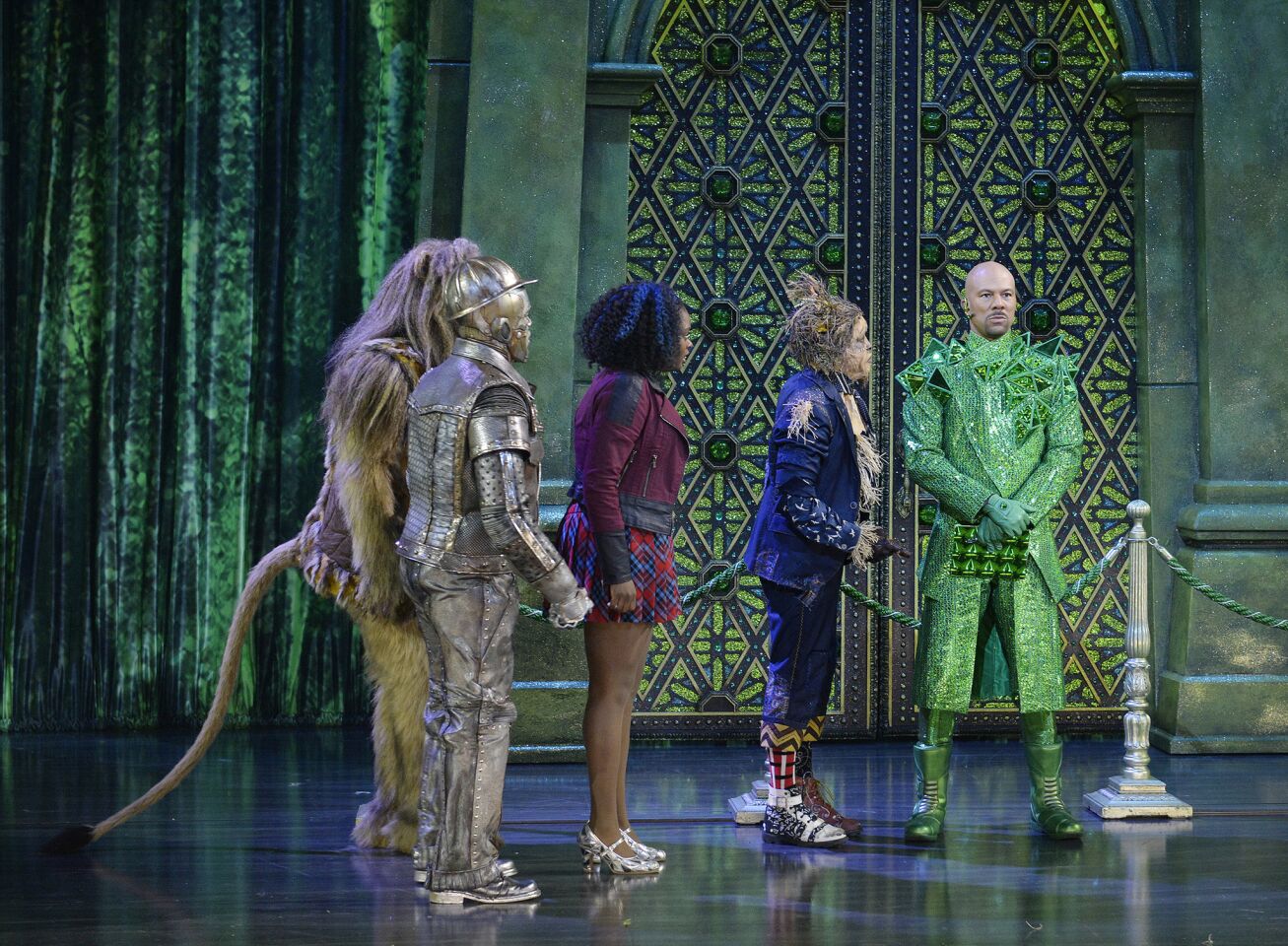 David Alan Grier as Lion, from left, Ne-Yo as Tin-Man, Shanice Williams as Dorothy, Elijah Kelley as Scarecrow and Common as the Bouncer during a dress rehearsal of "The Wiz Live!" in New York.