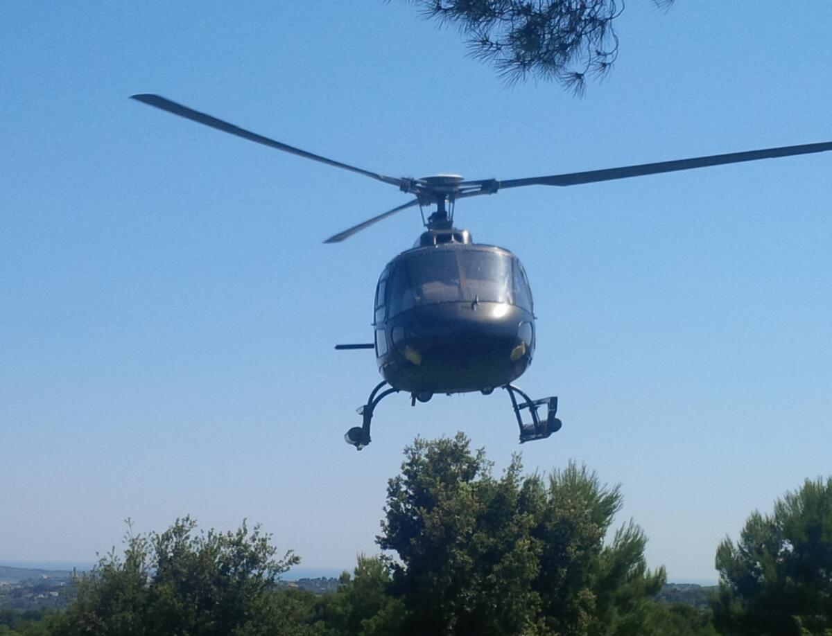 A helicopter takes off from a Cannes Film Festival party.