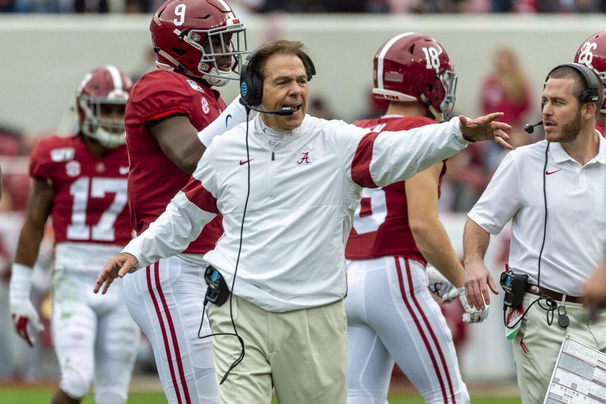 Alabama coach Nick Saban yells to his team