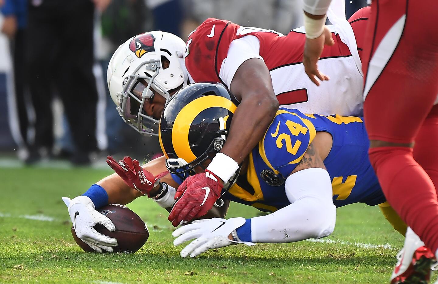 Rams safety Taylor Rapp recovers a fumble by Arizona Cardinals running back Kenyan Drake during the second quarter.