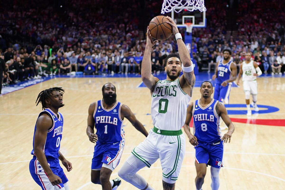 Tatum's 4th-quarter 3s push Celtics past 76ers 95-86; force Game 7